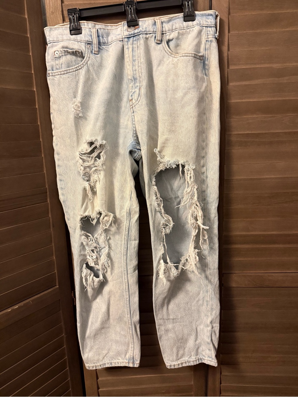 Light Wash Distressed mom jeans thrashed